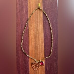 Coach Large Gold Heart Cutout Pendant Necklace with Red Gemstone